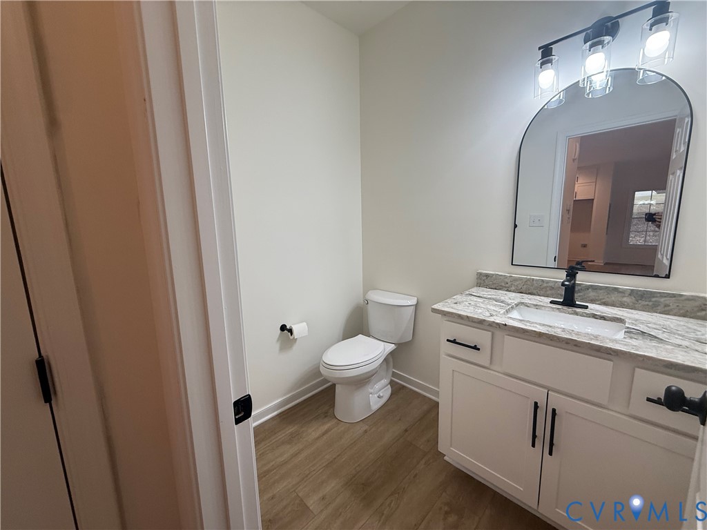 2700 Lake Albemarle Road Charlottesville, VA 22901 - Photo 10 of 25 Bathroom featuring vanity and dark wood-type floor