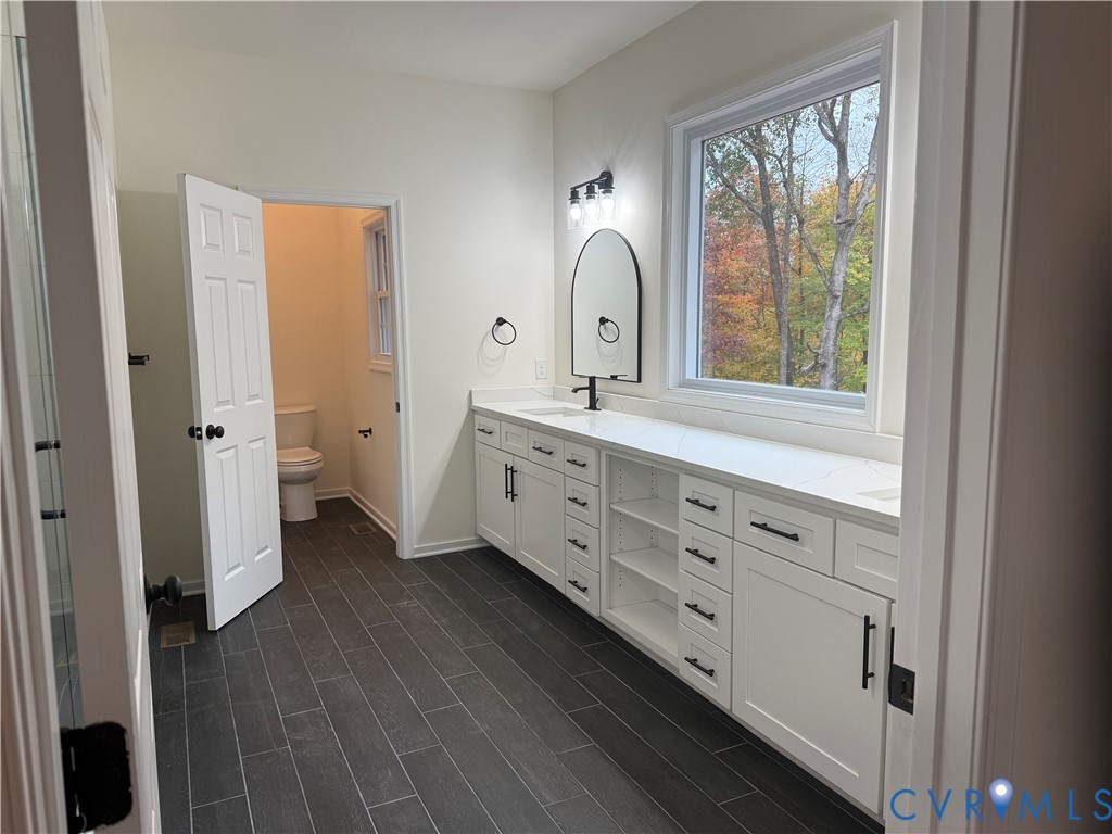 2700 Lake Albemarle Road Charlottesville, VA 22901 - Photo 12 of 25 Full bath with double vanity and wood tiled floors