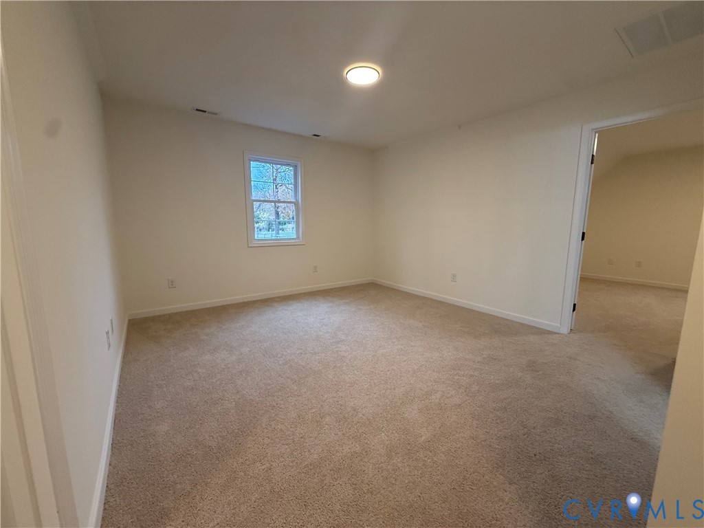2700 Lake Albemarle Road Charlottesville, VA 22901 - Photo 19 of 25 Unfurnished room featuring light colored carpet an