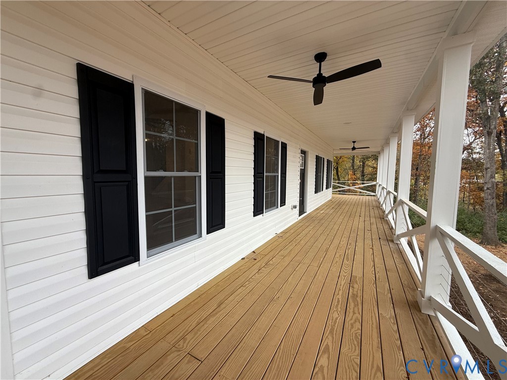 2700 Lake Albemarle Road Charlottesville, VA 22901 - Photo 3 of 25 Wooden deck with a ceiling fan