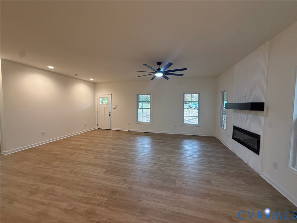 2700 Lake Albemarle Road Charlottesville, VA 22901 - Photo 6 of 25 Unfurnished living room with a large fireplace, re