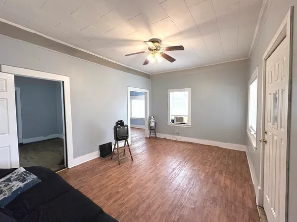 a view of an empty room with a window