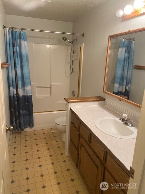 19944 Carper Road Southwest Rochester, WA 98579 - Photo 12 of 27 a bathroom with a sink and a mirror