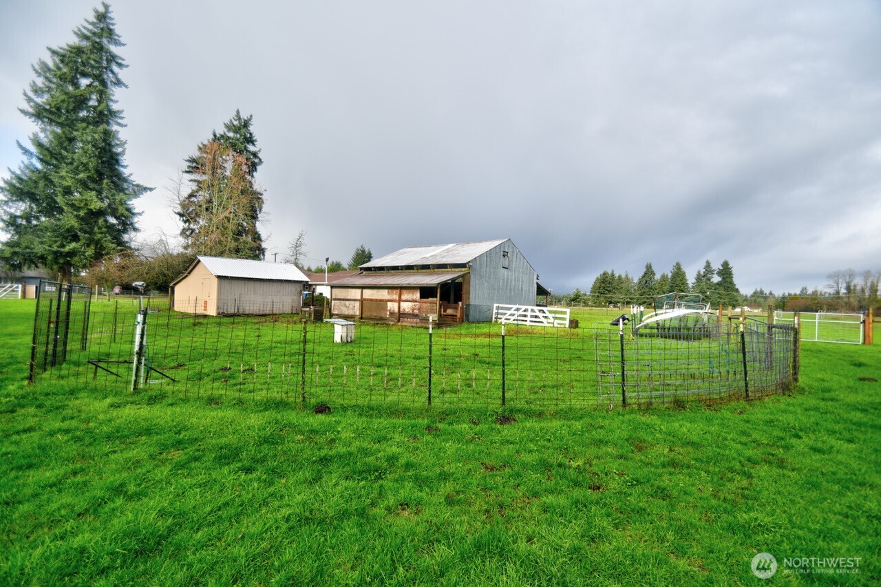 19944 Carper Road Southwest Rochester, WA 98579 - Photo 20 of 27 a view of house with backyard