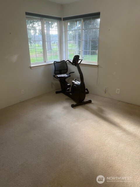 19944 Carper Road Southwest Rochester, WA 98579 - Photo 10 of 27 a room with furniture and a large window