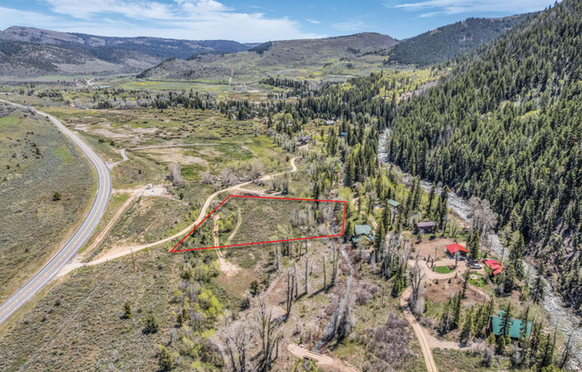 6314 Stewart Ranch Road Kamas, UT 84036 - Photo 8 of 10 Expansive mountain terrain parcel featuring a riverfront boundary, direct road access, and mature trees