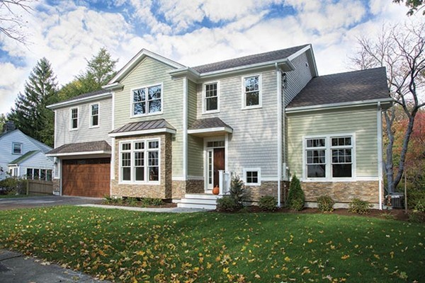85 Pond Brook Road Newton, MA 02467 - Photo 1 of 6 front view of a house with a yard