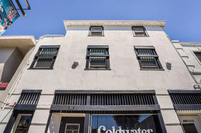 a front view of a building with balcony