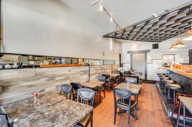 a view of a balcony with chairs