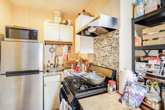 a view of a street with sitting area