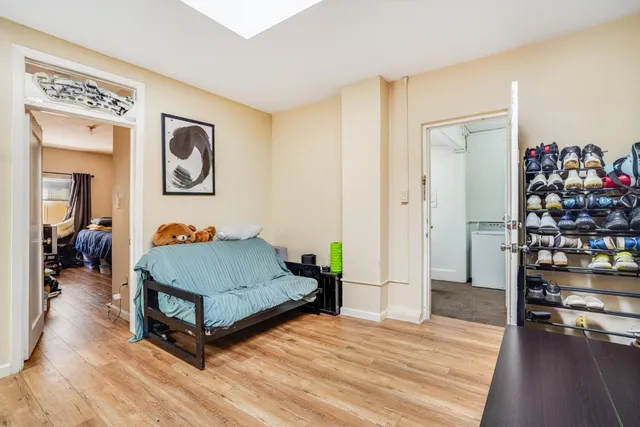 a kitchen with stainless steel appliances granite countertop a stove and a refrigerator