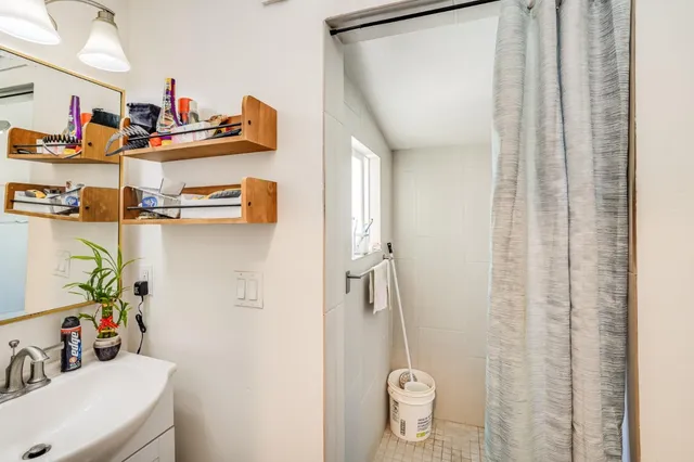 a picture of a bench in front of a door