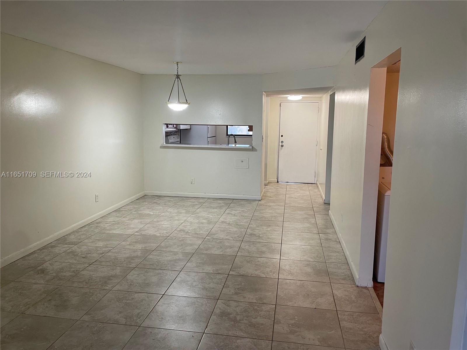 3252 Foxcroft Road, Unit 206 Miramar, FL 33025 - Photo 5 of 10 a view of a kitchen with a sink
