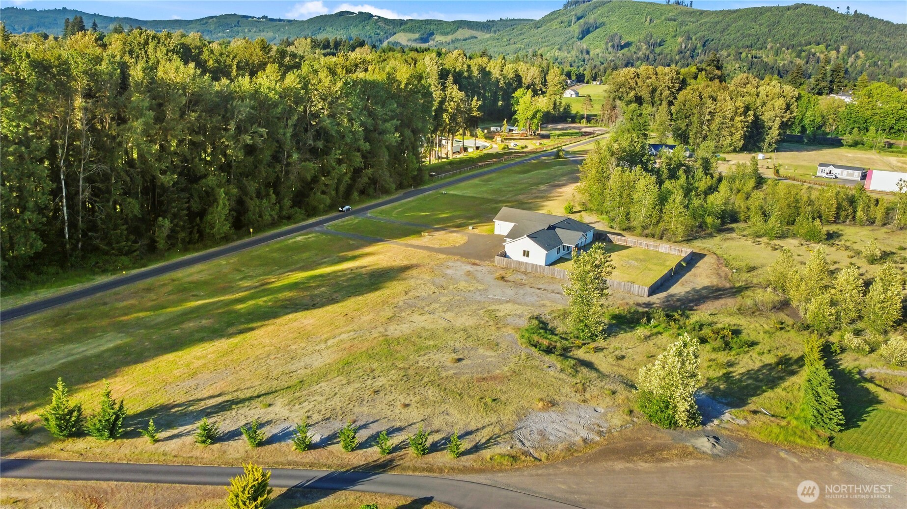 249 Flatt Road Kelso, WA 98626 - Photo 35 of 39 a view of a lake with a mountain