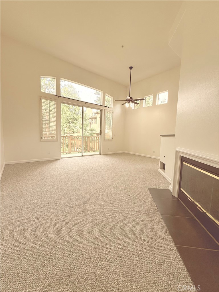 2771 Dunstan Drive Tustin, CA 92782 - Photo 13 of 39 a view of an empty room with a window