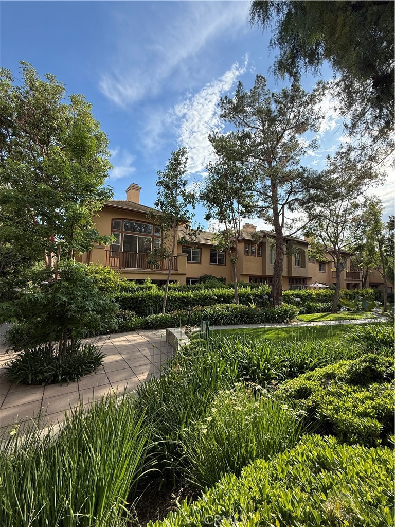 2771 Dunstan Drive Tustin, CA 92782 - Photo 2 of 39 a front view of a house with a yard