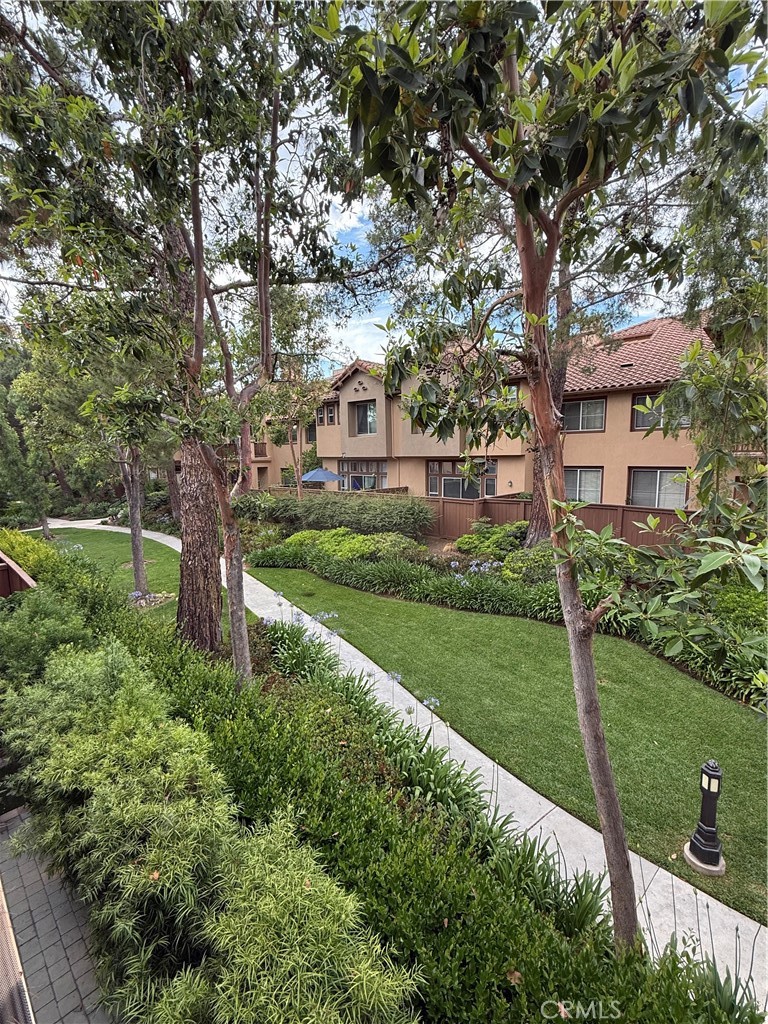 2771 Dunstan Drive Tustin, CA 92782 - Photo 23 of 39 a front view of a house with a yard