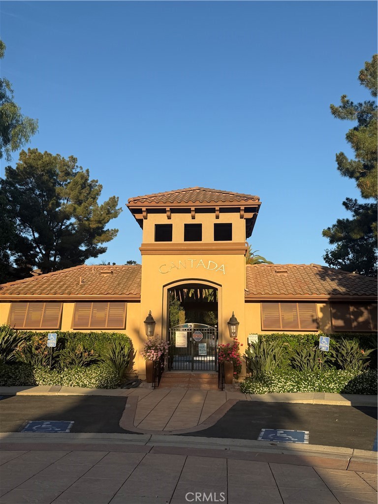 2771 Dunstan Drive Tustin, CA 92782 - Photo 34 of 39 a front view of a house with a yard