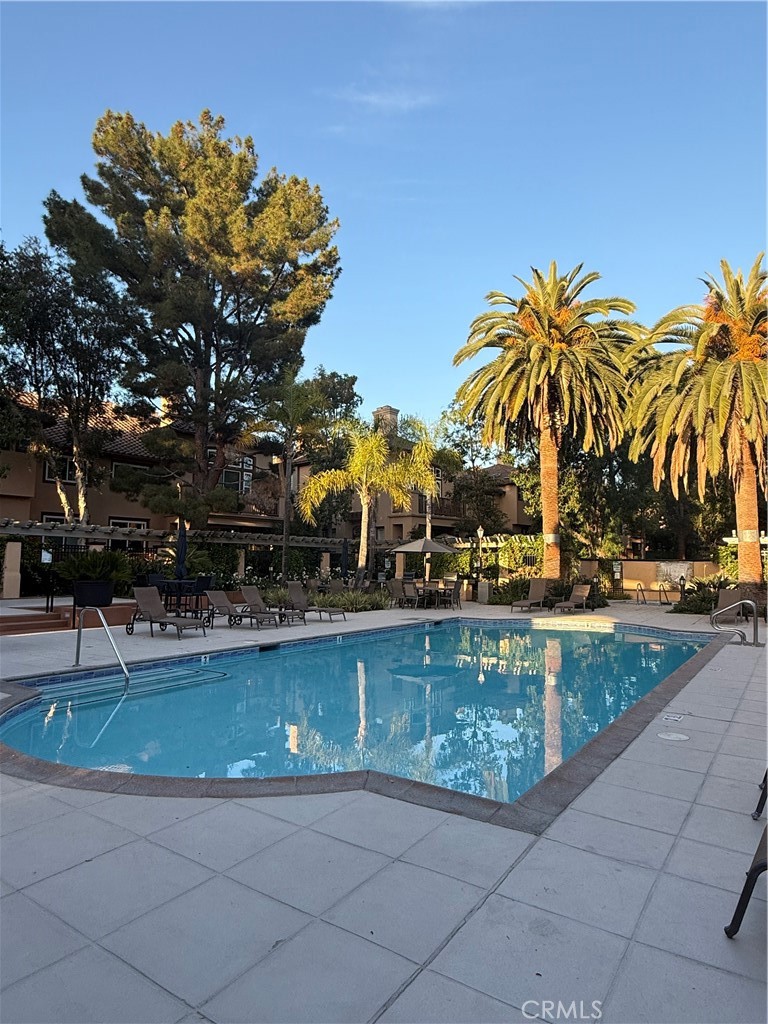 2771 Dunstan Drive Tustin, CA 92782 - Photo 36 of 39 a view of swimming pool with outdoor seating and plants