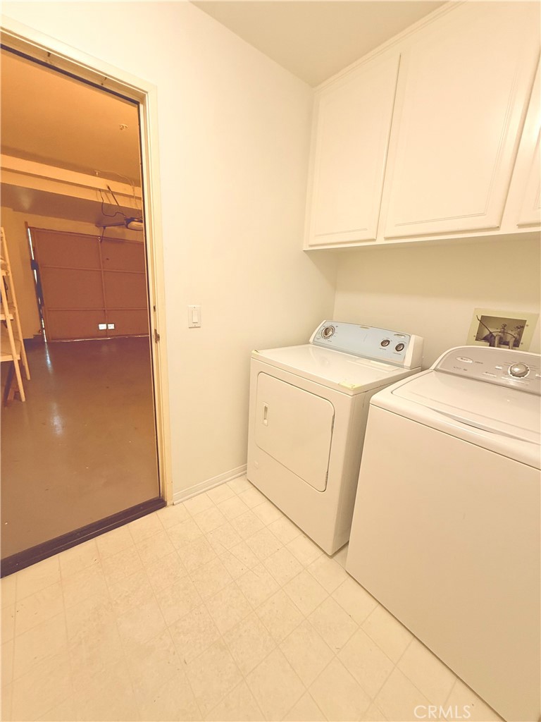 2771 Dunstan Drive Tustin, CA 92782 - Photo 9 of 39 a utility room with dryer and washer