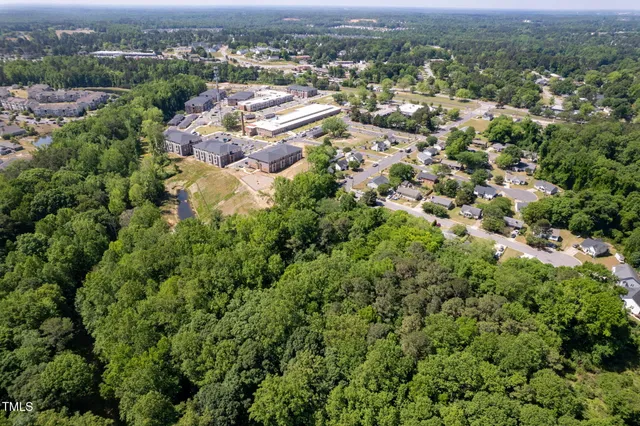an aerial view of a city with lots of residential buildings