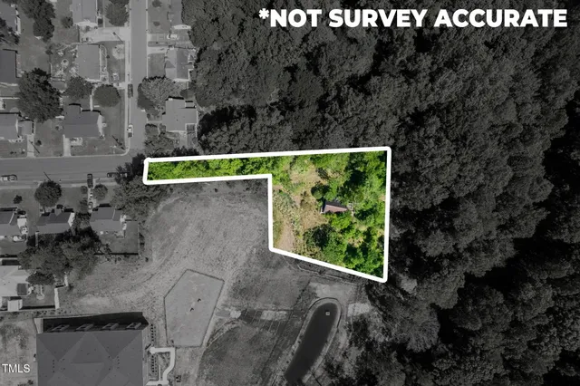 an aerial view of residential house with outdoor space and street view