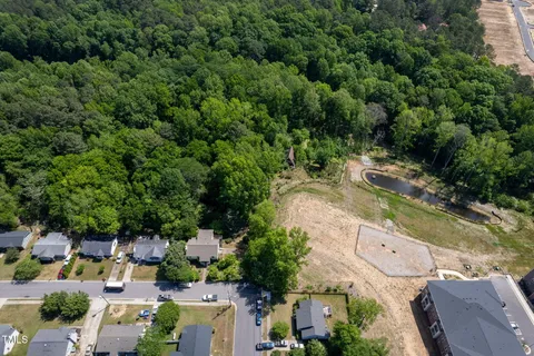 an aerial view of a city with lots of residential buildings