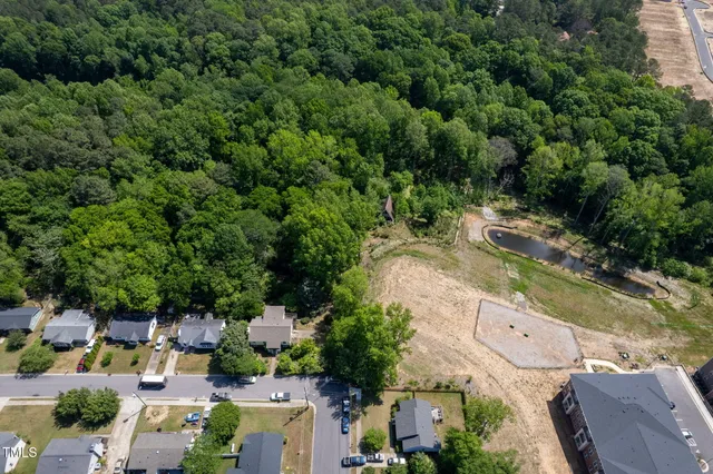 an aerial view of a city with lots of residential buildings