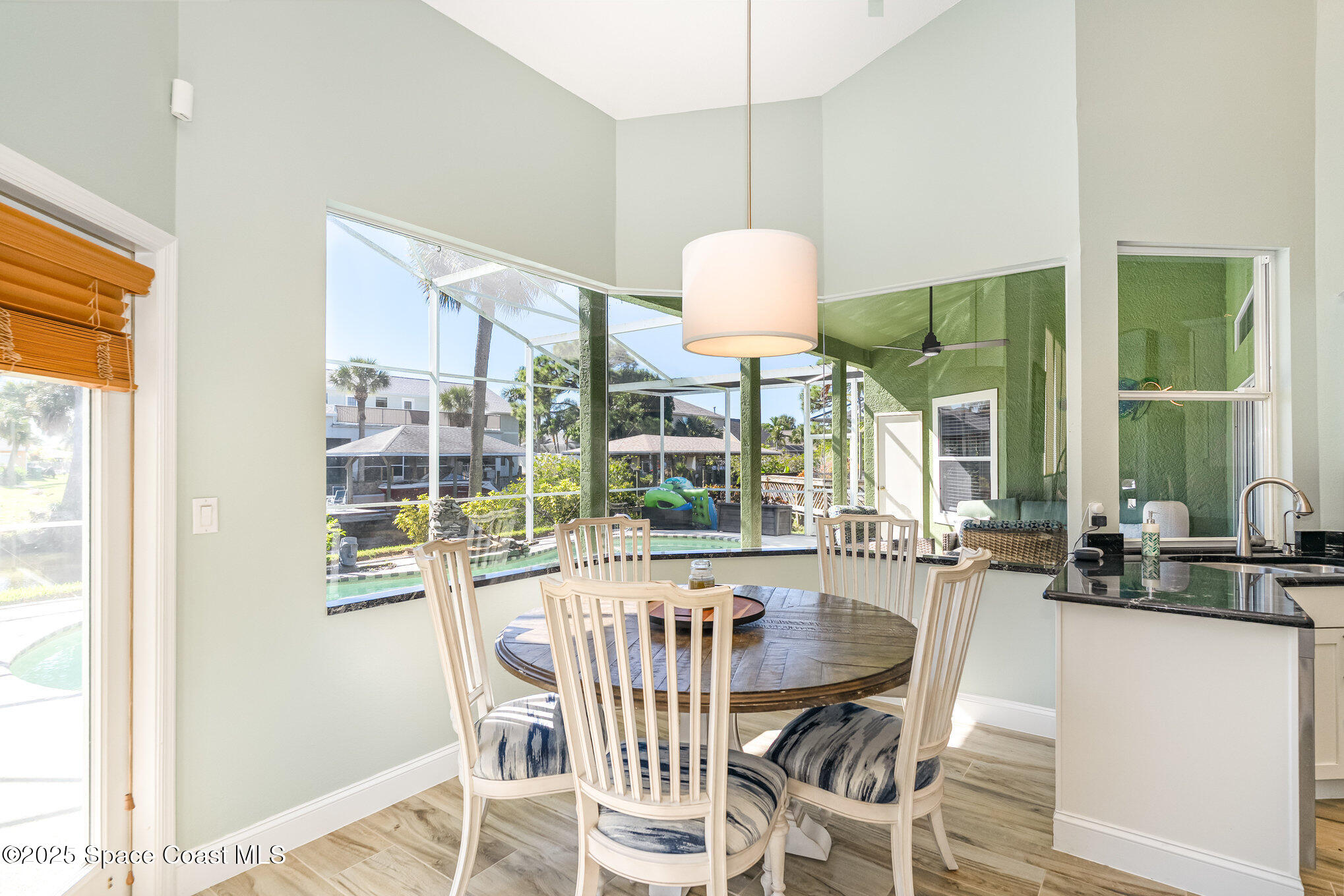1617 Sun Point Place Merritt Island, FL 32952 - Photo 16 of 42 a view of a dining room and livingroom view