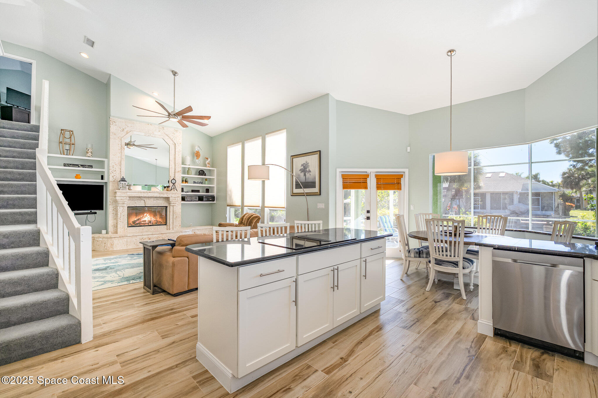 1617 Sun Point Place Merritt Island, FL 32952 - Photo 7 of 42 a kitchen with stainless steel appliances granite countertop a stove and cabinets