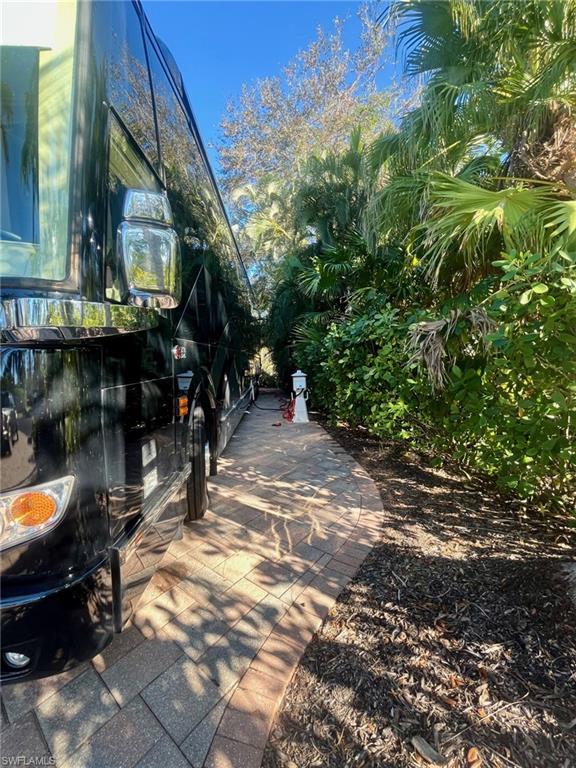 5003 Coach Lane Naples, FL 34114 - Photo 9 of 17 a view of street and patio