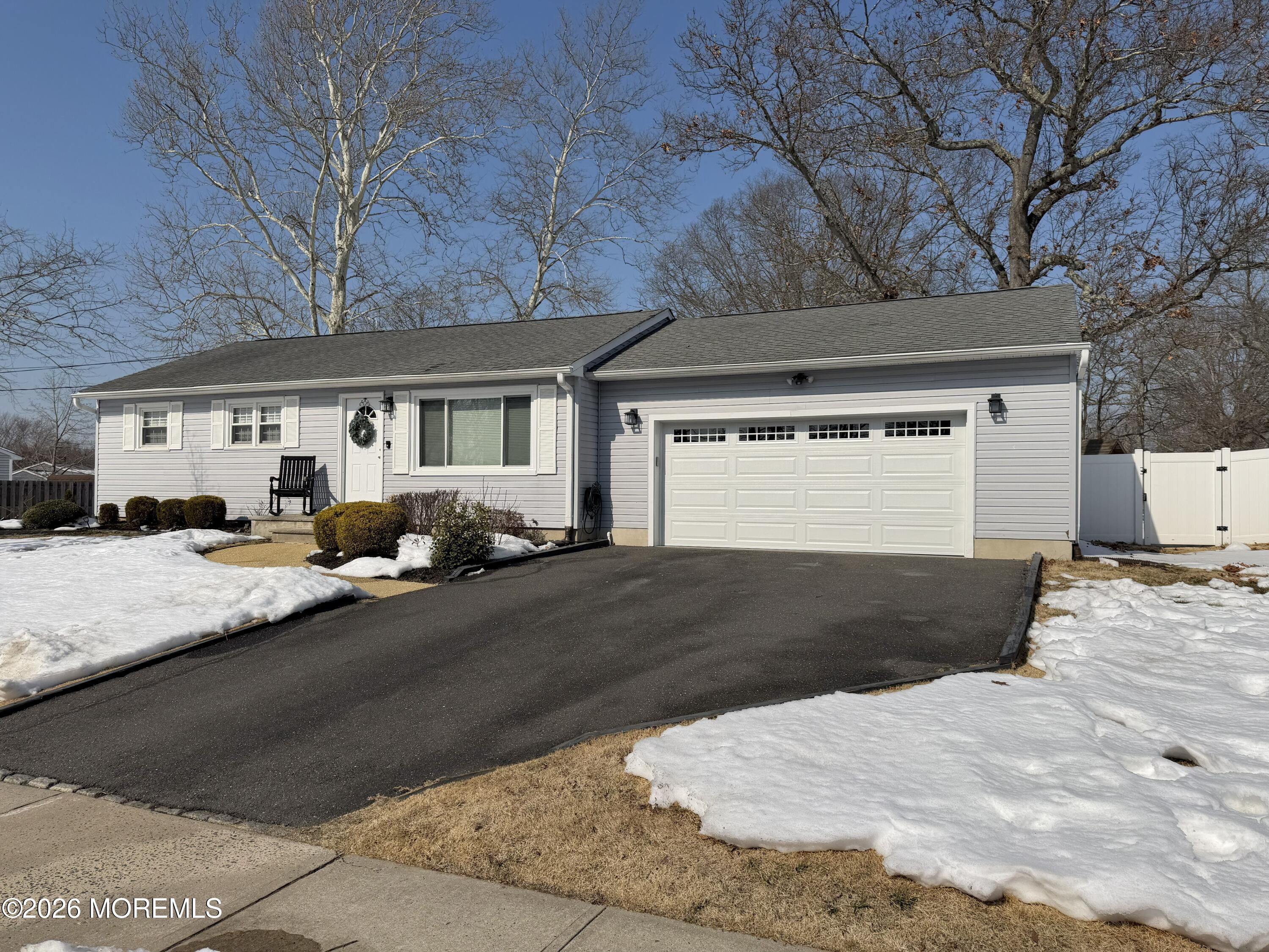 43 Lake Drive Howell, NJ 07731 - Photo 15 of 22 a view of back yard of the house