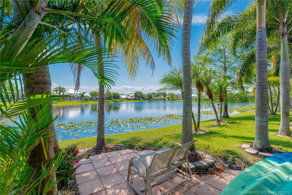 2032 Northwest Marsh Rabbit Lane Stuart, FL 34994 - Photo 4 of 30 a view of a backyard with a garden