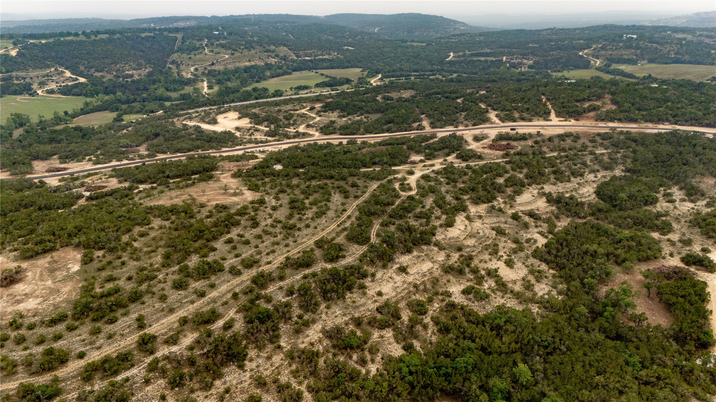 Lot 20 Ranch Road 165 Dripping Springs, TX 78620 - Photo 5 of 9 Expansive natural terrain featuring varied topography and extensive tree coverage