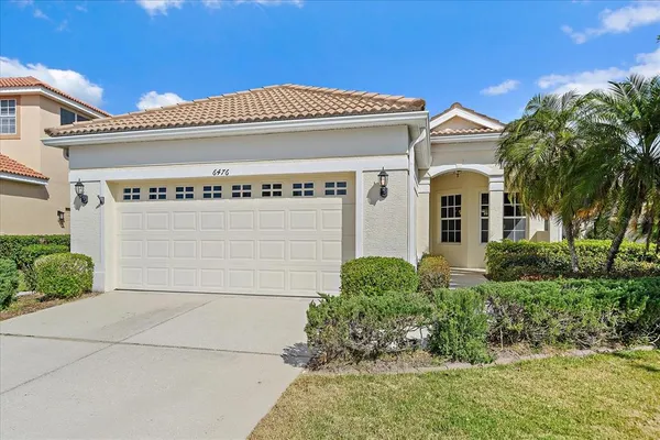 a view of a house with a garage