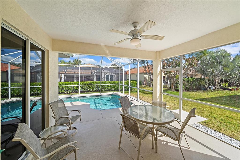 6476 Rookery Circle Bradenton, FL 34203 - Photo 27 of 44 a view of a living room and porch with furniture and garden