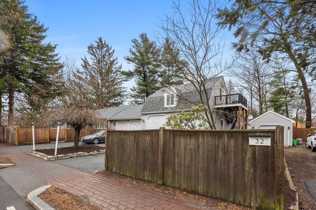 30 Allandale Street Boston, MA 02130 - Photo 30 of 33 a view of a house with a wooden fence