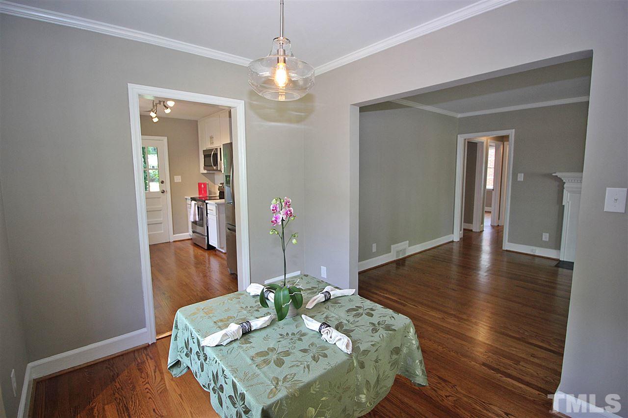1204 Mitchell Street Raleigh, NC 27607 - Photo 11 of 22 a living room with furniture and a wooden floor