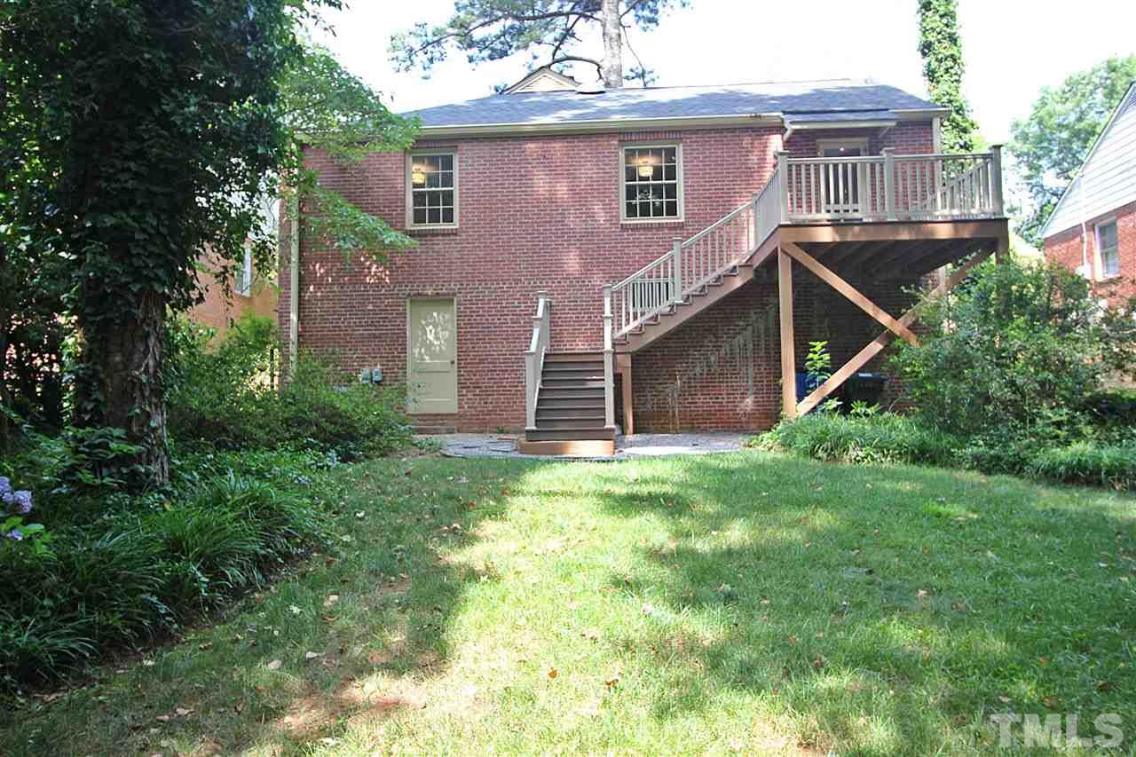 1204 Mitchell Street Raleigh, NC 27607 - Photo 19 of 22 a front view of a house with a yard