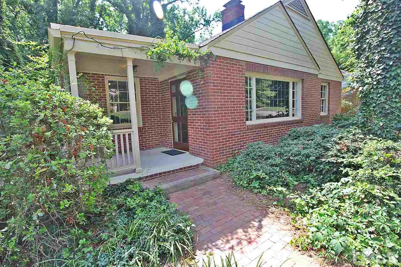 1204 Mitchell Street Raleigh, NC 27607 - Photo 21 of 22 front view of a house with potted plants