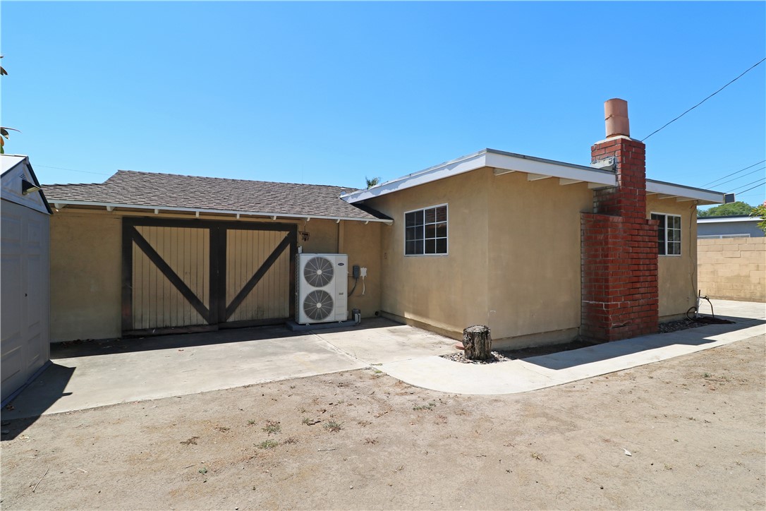 721 North Milford Road Orange, CA 92867 - Photo 30 of 38 Barn doors open to the garage.