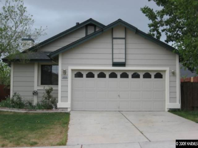 5950 Walnut Creek Road Reno, NV 89523 - Photo 1 of 7 a front view of a house with garden