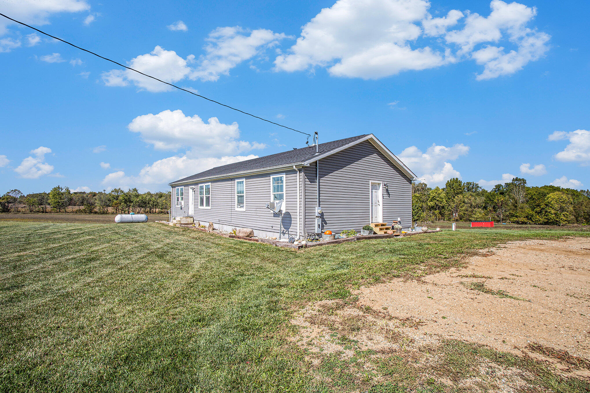 208 Booth Road Bronson, MI 49028 - Photo 2 of 28 002_208_booth_rd_bronson_mi_49028_42_of_