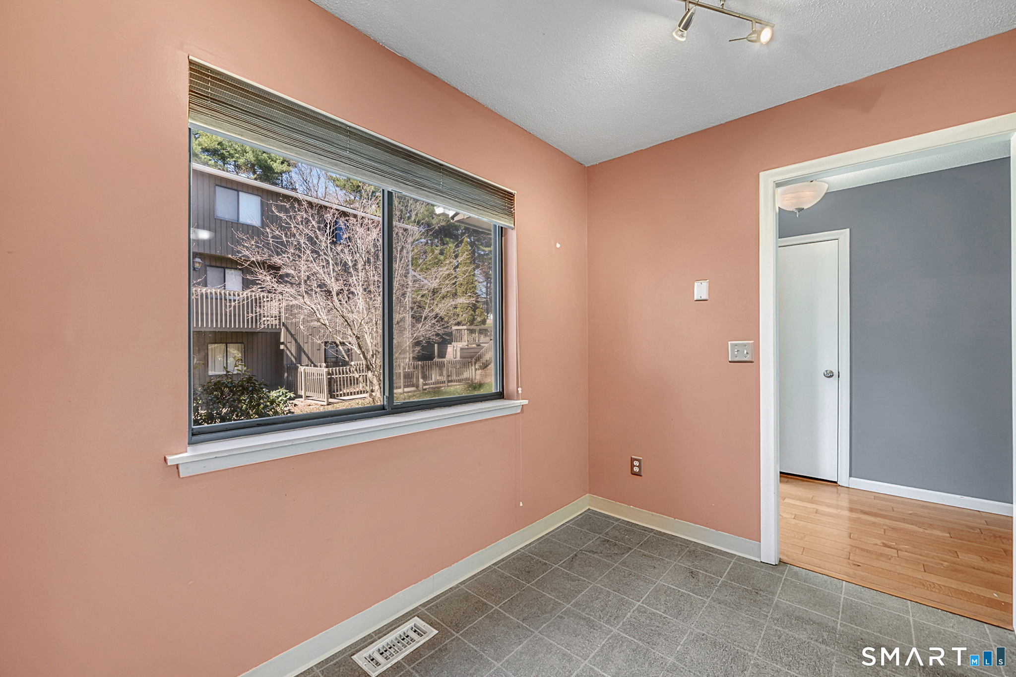 160 Brittany Farms Road, Unit F New Britain, CT 06053 - Photo 16 of 35 an empty room with windows