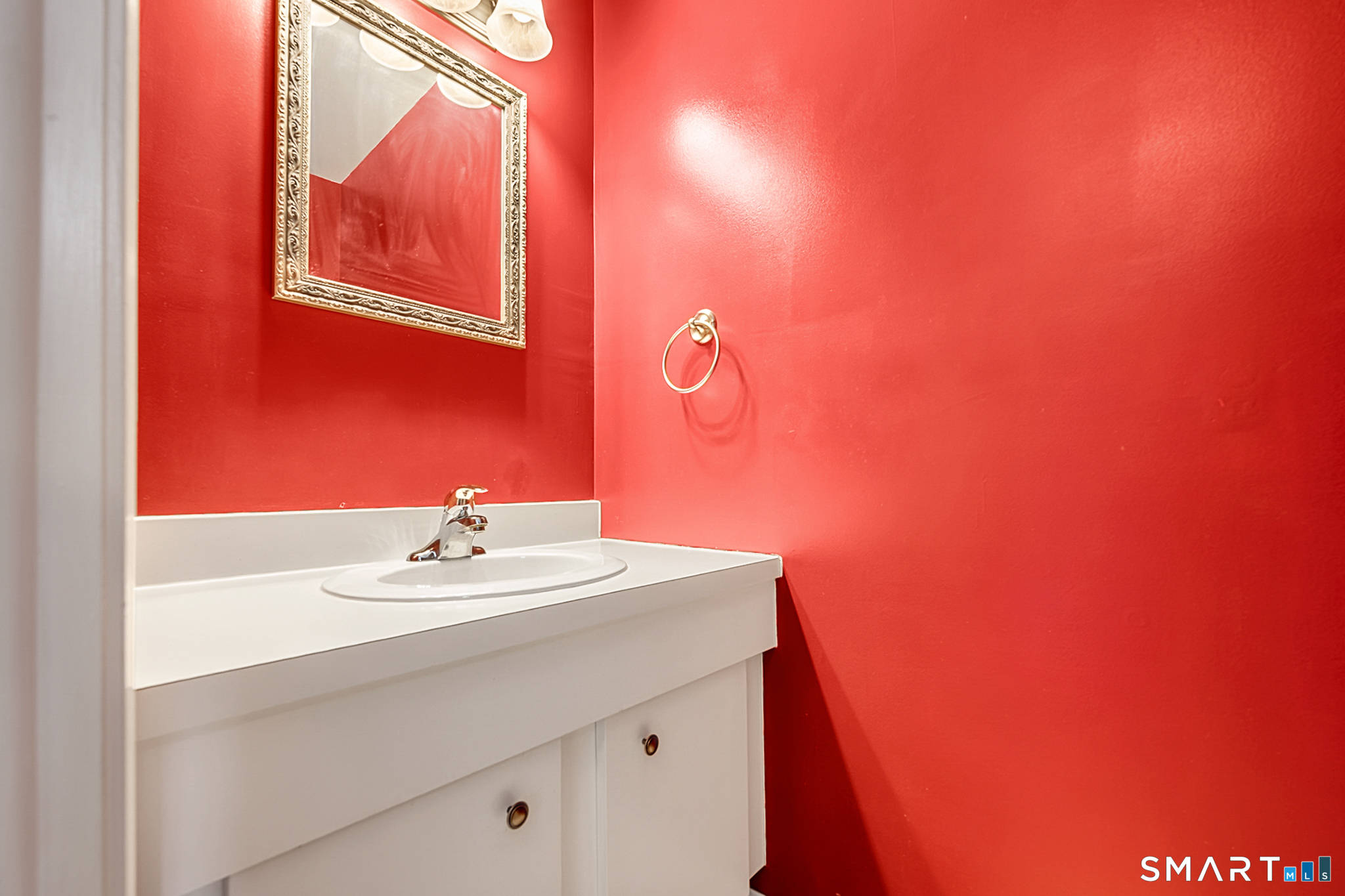 160 Brittany Farms Road, Unit F New Britain, CT 06053 - Photo 17 of 35 a bathroom with a sink and a mirror