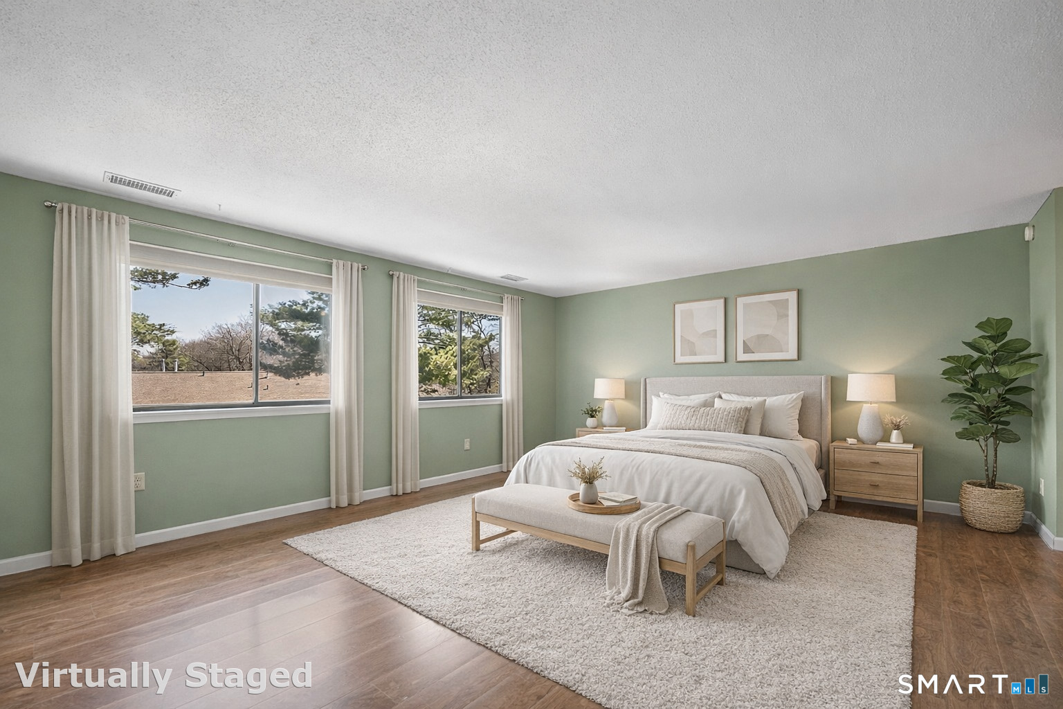 160 Brittany Farms Road, Unit F New Britain, CT 06053 - Photo 18 of 35 a bedroom with a large bed and a window