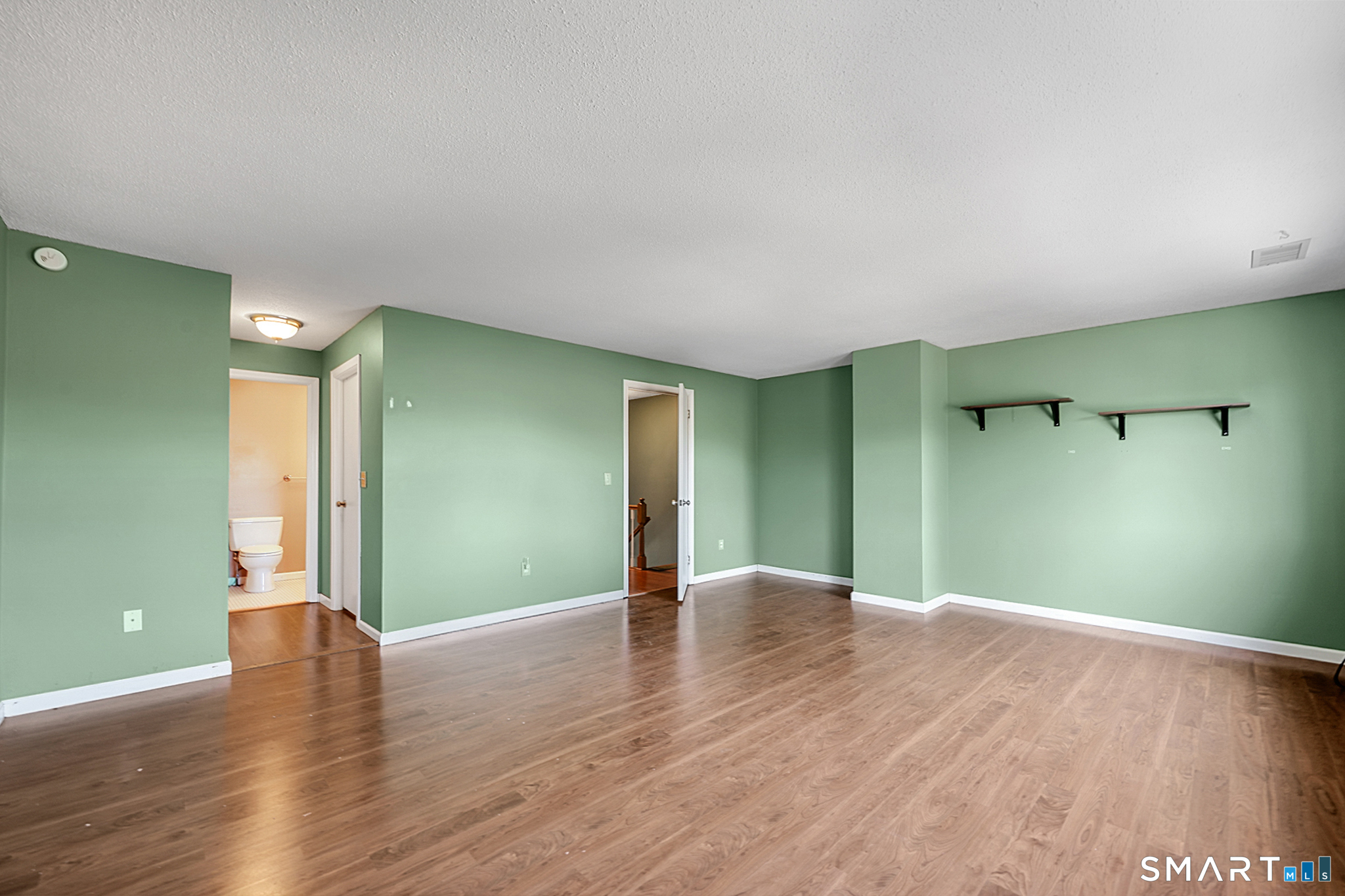 160 Brittany Farms Road, Unit F New Britain, CT 06053 - Photo 21 of 35 a view of livingroom with window