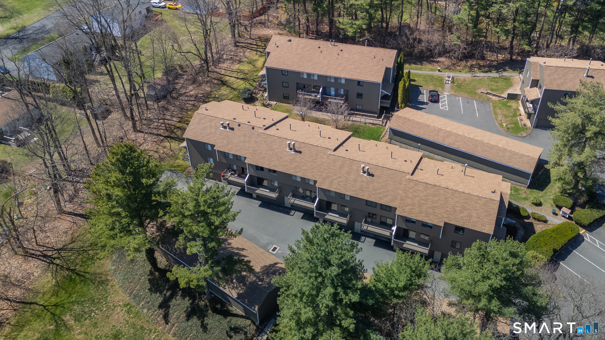 160 Brittany Farms Road, Unit F New Britain, CT 06053 - Photo 35 of 35 an aerial view of a house with a yard and lake view