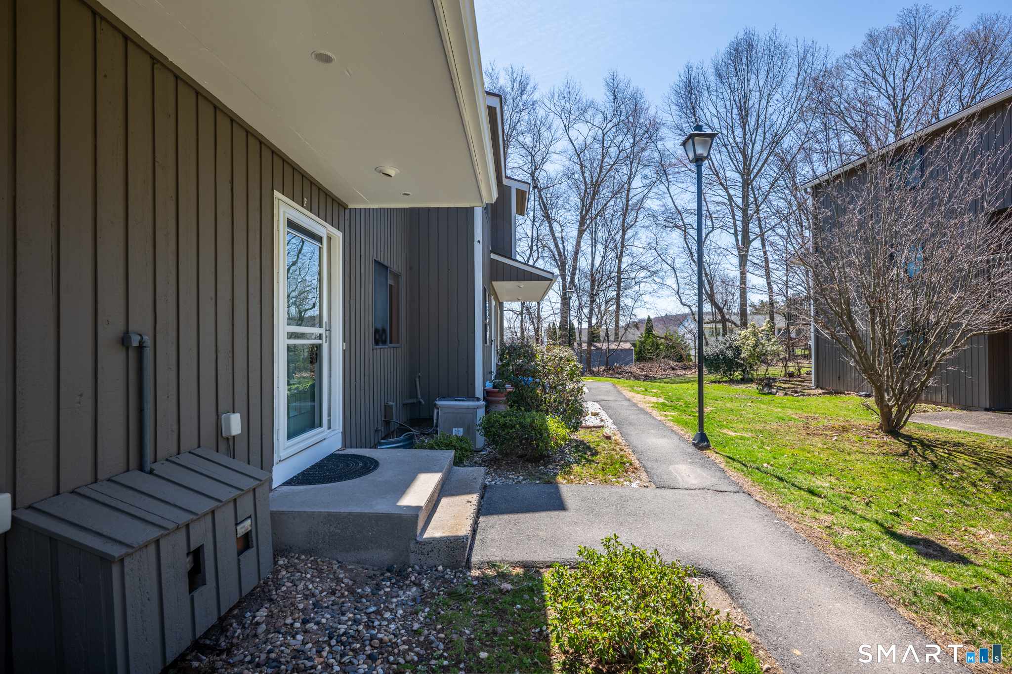 160 Brittany Farms Road, Unit F New Britain, CT 06053 - Photo 4 of 35 a view of a house with backyard and sitting area