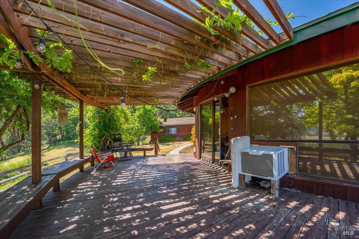 125 Cedar Gulch Road Hayfork, CA 96041 - Photo 48 of 57 a view of a patio with a table chairs and a backyard